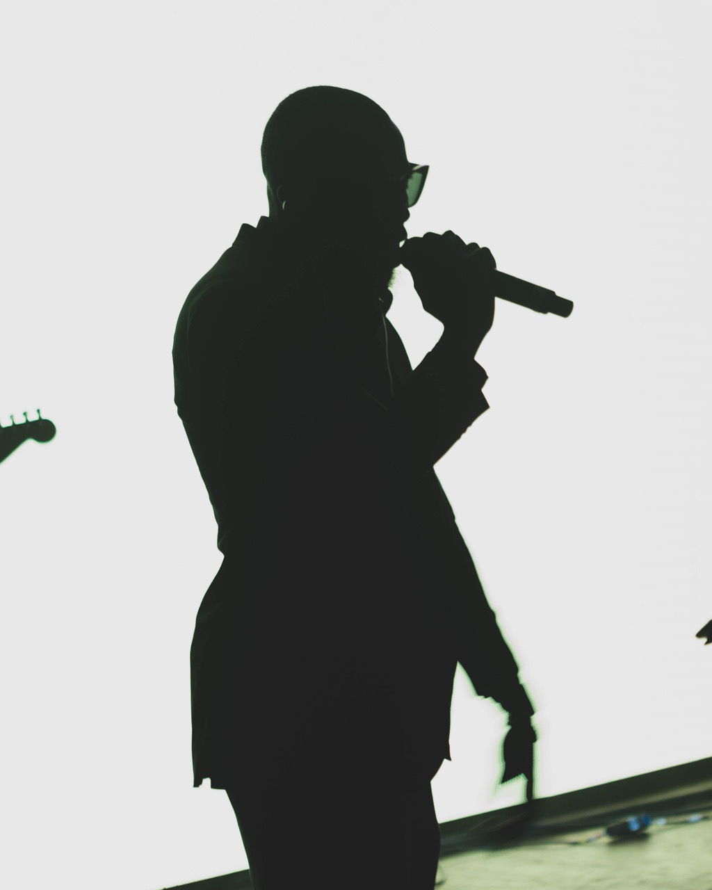 D. Krieton performing live — stage silhouette